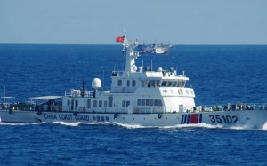 In this photo released the Japan Coast Guard, a Chinese coastguard vessel sails near disputed East China Sea islands on Saturday. Photo: AP In this photo released the Japan Coast Guard, a Chinese coastguard vessel sails near disputed East China Sea islands on Saturday. Photo: AP