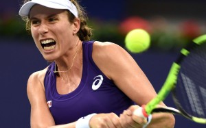 Johanna Konta makes a return during her match against Samantha Stosur in the Elite Trophy tournament in Zhuhai. Photos: Xinhua