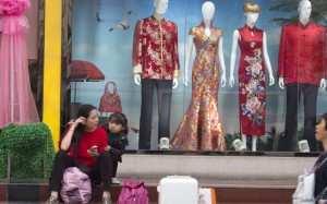 Mannequins display traditional Chinese dresses at a shop in Beijing. Photo: AP