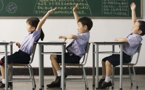 China rolled out its nine-year compulsory education programme in the 1980s. Parents are required to send their school-age children to study, and funding for public schools is guaranteed by the state. Photo: Randy Faris/Corbis