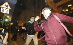 Objects are thrown during the Mong Kok riot in February. Photo: Edward Wong