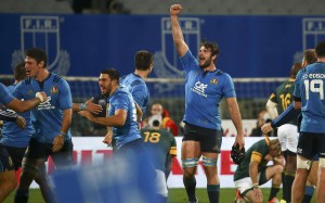 Italian players celebrate at the end of the match against South Africa. Photo: Reuters