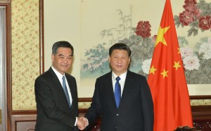 Leung Chun-Ying with President Xi Jinping during a visit to Beijing in December last year. After the Lima handshake last week, Leung will embark on his annual duty visit to Beijing next month, where more handshakes with Xi and other state leaders are expected. Photo: SCMP Pictures
