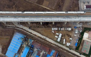 A train runs on the Beijing-Shanghai high-speed rail near the site of a blast at chemical plant in Jinan, in east China's Shandong province. Photo: Xinhua