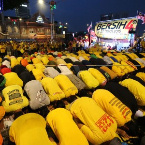 Malaysian Muslims pray during the protest rally by electoral concern group Bersih last year. The release of the emails comes ahead of another rally planned by the group this month. Photo: AFP