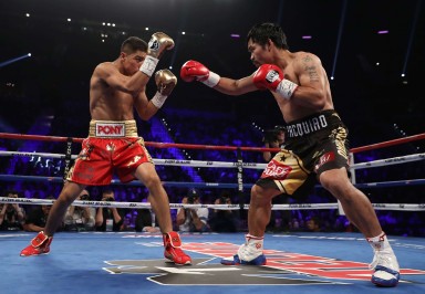 Manny Pacquiao of the Philippines and Jessie Vargas square off during their WBO welterweight championship fight at the Thomas & Mack Centre. Photo: AFP