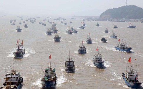 Boats set out from Zhoushan, Zhejiang province, for the fishing grounds of the East China Sea. Photo: Xinhua