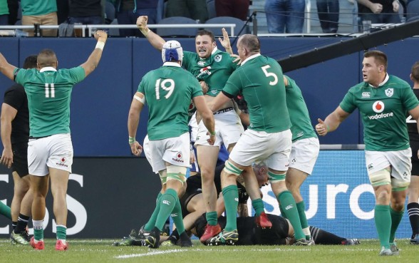 Ireland’s Robbie Henshaw (centre) celebrates with teammates after scoring during his side’s history-making win over New Zealand on Sunday morning (Hong Kong time). Photo: AP Ireland’s Robbie Henshaw (centre) celebrates with teammates after scoring during his side’s history-making win over New Zealand on Sunday morning (Hong Kong time). Photo: AP