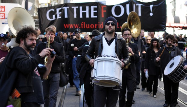 Unidentified Protesters march against the use of fluoride in drinking water in San Francisco. The Marchers believe that fluoride causes health problems.