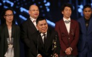 Executive producer Andrew Choi accepts the Best Film crown at the Hong Kong Film Awards. Photo: Reuters