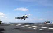 An FA-18 jet fighter takes off on the USS John C. Stennis, an American aircraft carrier in the South China Sea on Friday, April 15, 2016. US ships have started conducting joint patrols in the South China Sea with the Philippines. Photo: AP