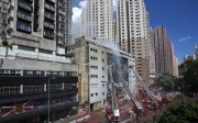 Fourth-alarm blaze in Ngau Tau Kok industrial building continues. Photo: Edward Wong