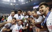 Football Soccer - Portugal v France - EURO 2016 - Final - Stade de France, Saint-Denis near Paris, France - 10/7/16 Portugal celebrate with the trophy after winning Euro 2016 REUTERS/Darren Staples Livepic