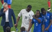 Didier Deschamps hangs his head after the final whistle. Photo: AFP