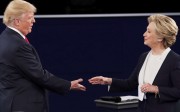 Republican nominee Donald Trump and Democratic nominee Hillary Clinton close the second US presidential debate with a handshake. Photo: Reuters