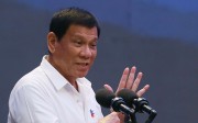 Ahead of a visit to China, the Philippine president acknowledged that he can be impeached if he concedes his country's territorial claims in the South China Sea in talks with President Xi Jinping and other leaders. Photo: AP Ahead of a visit to China, the Philippine president acknowledged that he can be impeached if he concedes his country's territorial claims in the South China Sea in talks with President Xi Jinping and other leaders. Photo: AP