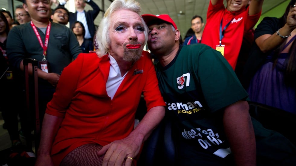 Richard Branson serves as AirAsia stewardess after losing bet | South China Morning Post