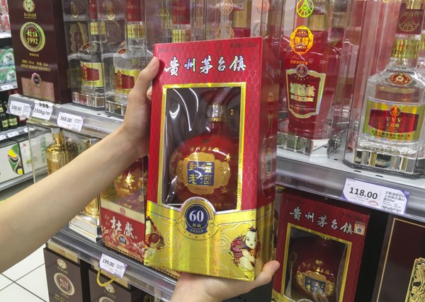 Chinese liquor stocks Kweichow Moutai and Luzhou Laojiao have soared this year. Photo: Martin Chan