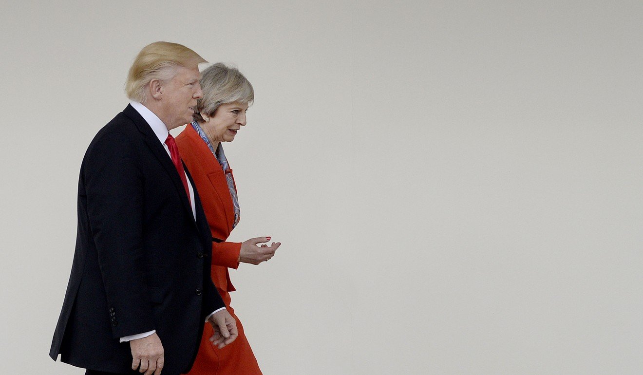 US President Donald Trump walks with British Prime Minister Theresa May outside the White House in Washington. Photo: Bloomberg