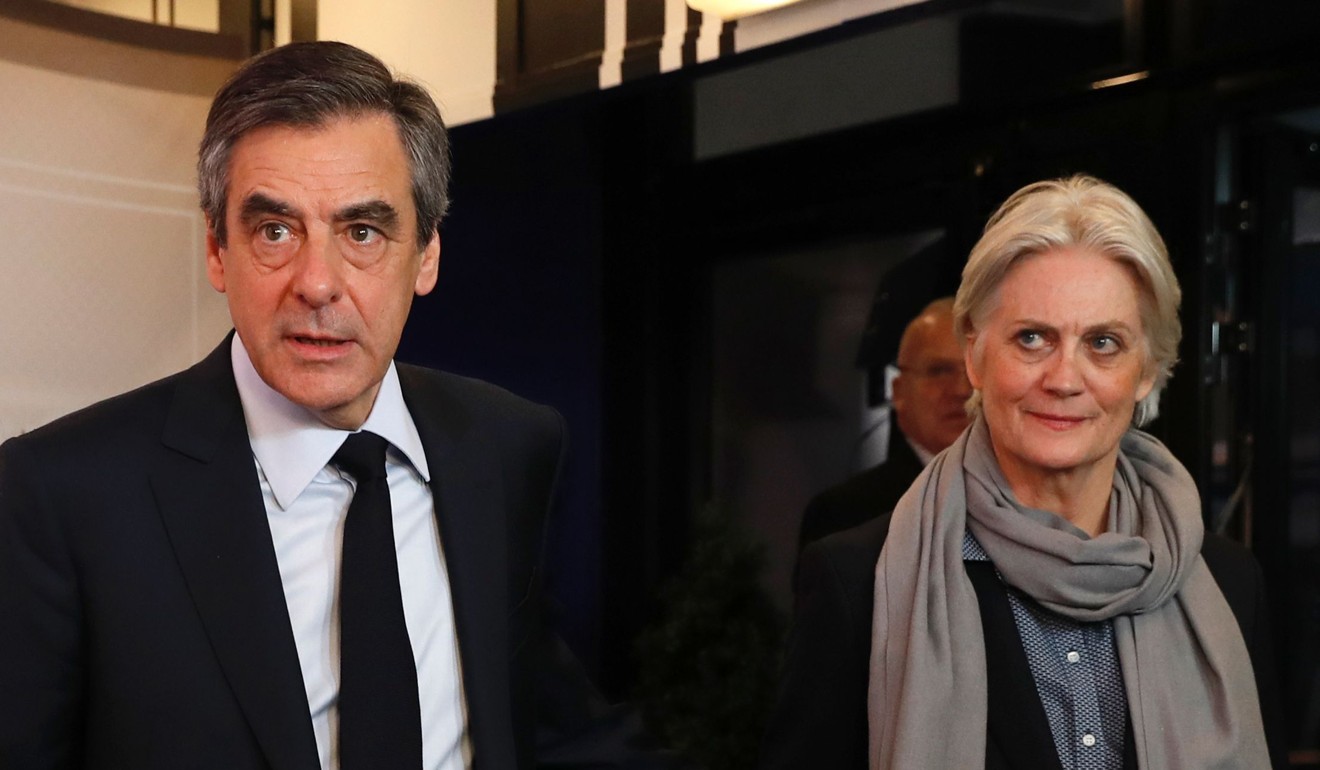 Francois Fillon with his wife Penelope Fillon. Photo: AFP