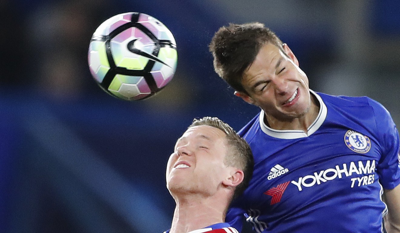 Chelsea's Cesar Azpilicueta, right, heads the ball against Middlesbrough's Adam Foreshaw during the English Premier League soccer match between Chelsea and Middlesbrough at Stamford Bridge stadium in London. Photo: AP