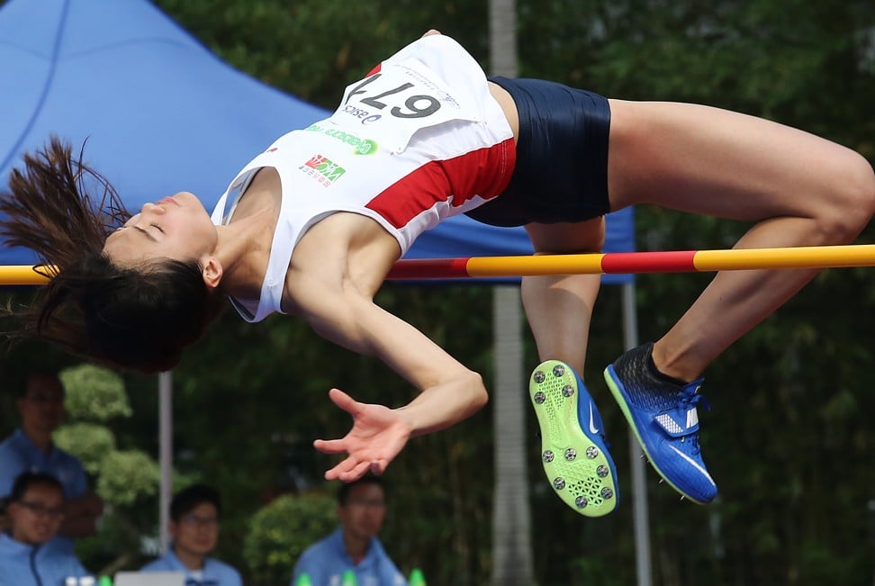 Cecilia Yeung Man-wai clears the bar in Wan Chai on Sunday. Photo: Jonathan Wong