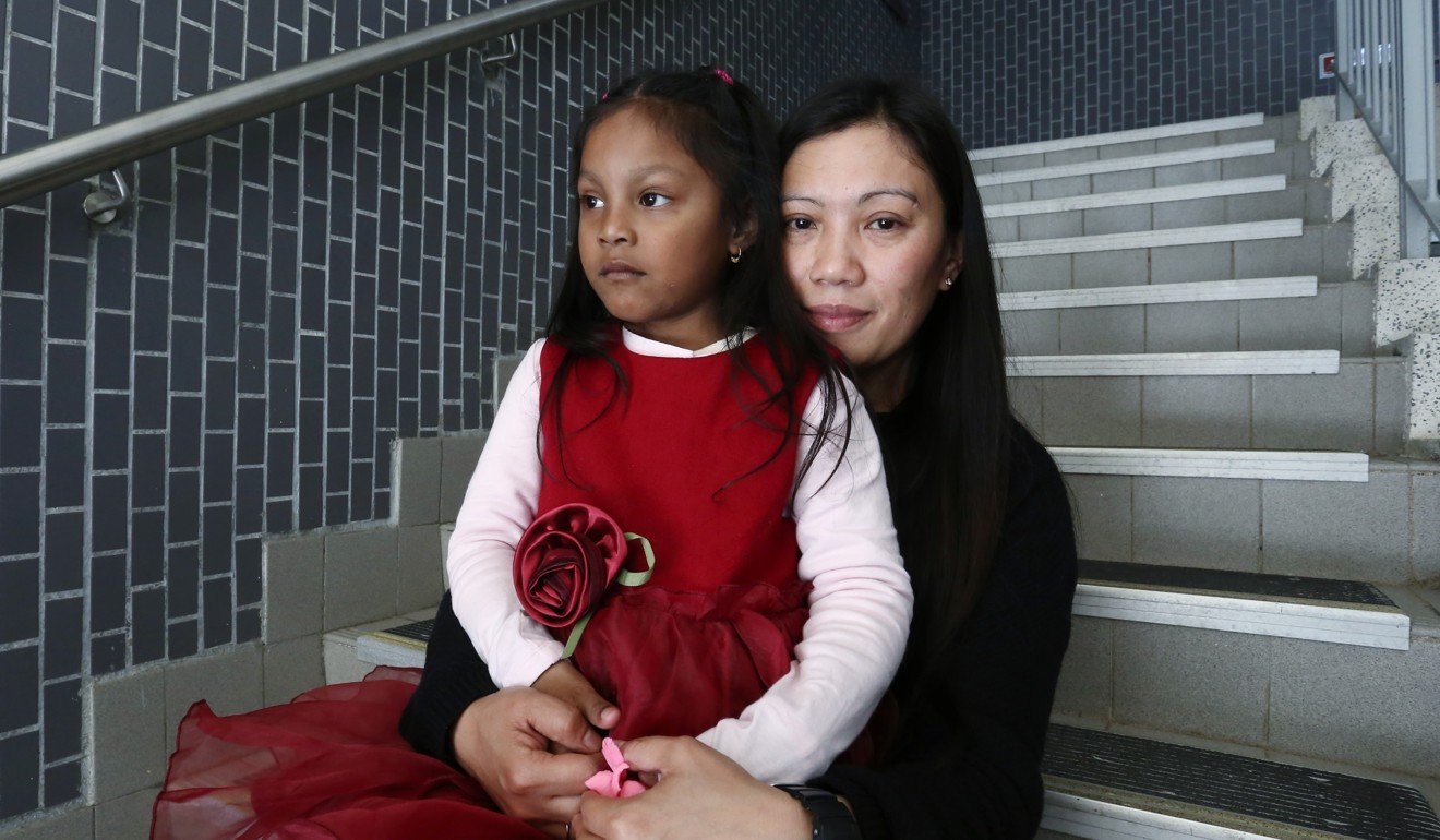 Asylum seeker Vanessa Mae Rodel with her daughter. Photo: Jonathan Wong