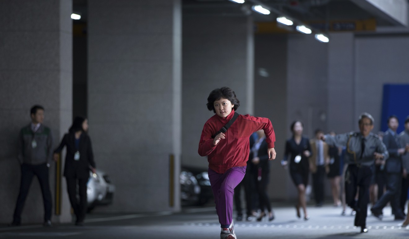 Seo-Hyun Ahn in a scene from Okja, one of two Netflix films in competition at Cannes. Photo: Netflix via AP