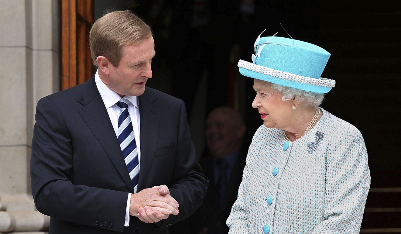 Britain's Queen Elizabeth II is greeted by Irish Prime Minister Enda Kenny at Government Buildings in Dublin in 2011. Photo: AP