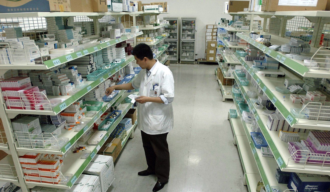 AA Chinese pharmacist checks his stocks of medicine at a hospital pharmacy in Hefei, central China's Anhui province. Photo: AFP