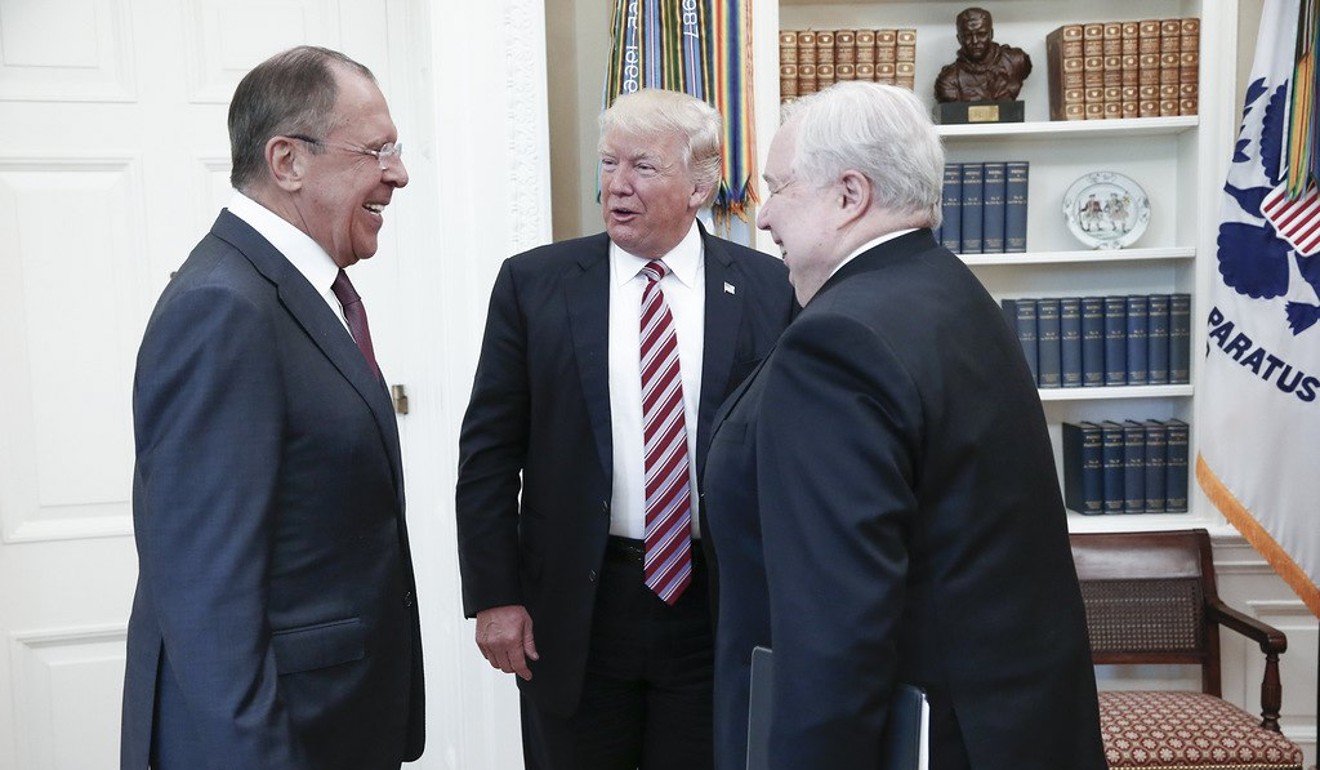 A photo made available by the Russian Foreign Ministry shows US President Donald Trump (centre) speaking with Russian Foreign Minister Sergei Lavrov (left) and Russian Ambassador to the US Sergei Kislyak in the Whote House on May 10. Photo: EPA