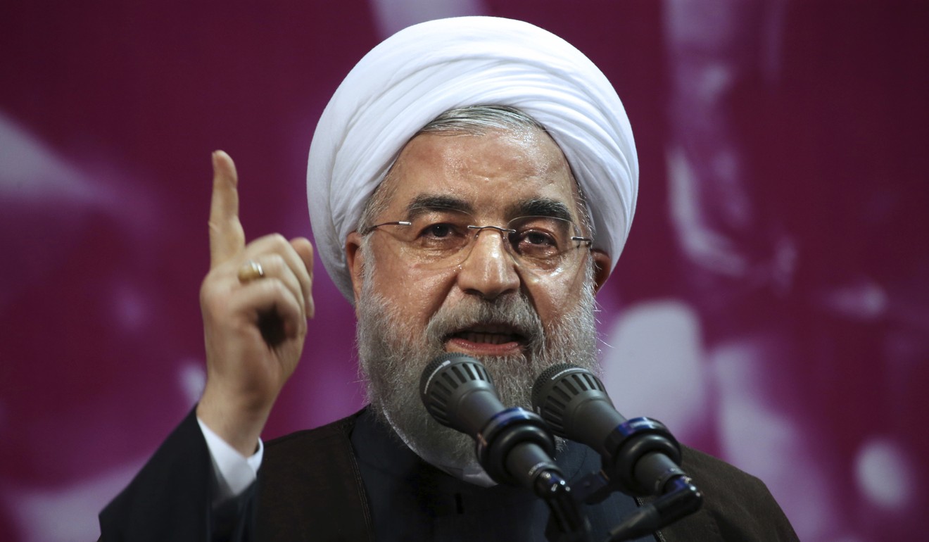 Iranian President Hassan Rowhani speaks in a campaign rally. Photo: AP