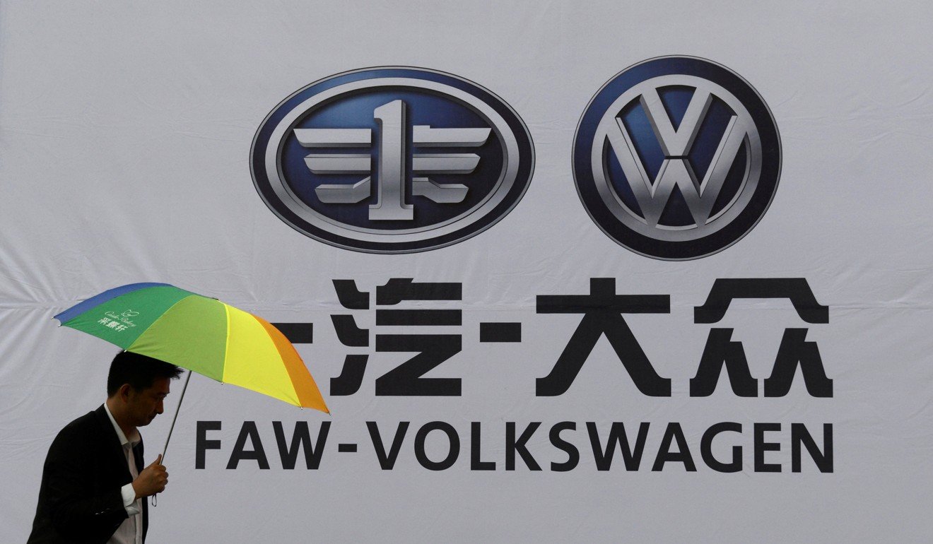 The logo of FAW-Volkswagen is on view at a 2014 automobile exhibition in Fuyang, Anhui province. European companies would like China to open up its automotive market to them.