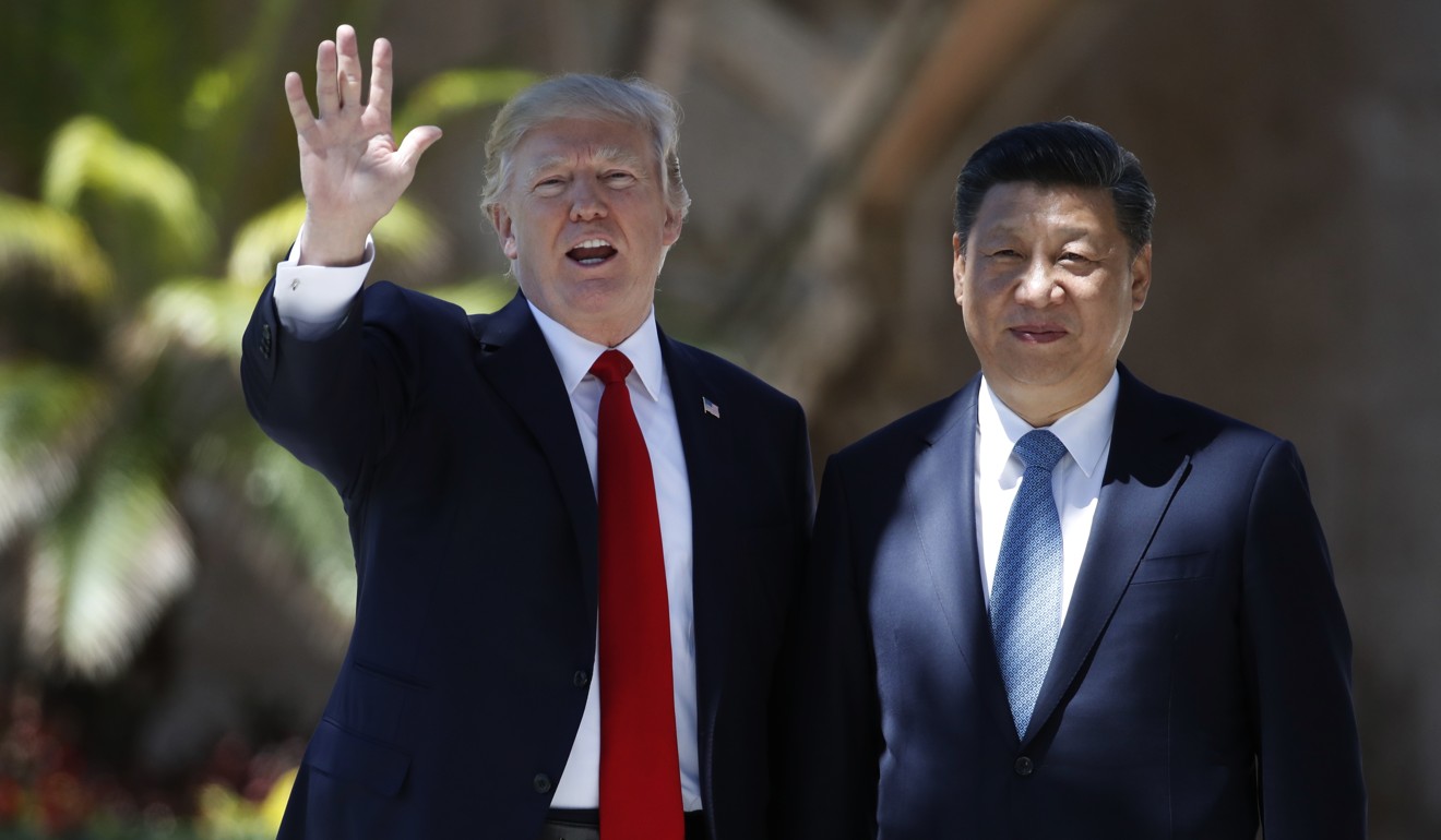 US President Donald Trump and Chinese President Xi Jinping pause for photographs during their summit meeting at Trump’s Mar-a-Lago estate, in Palm Beach, Florida in April. Photo: AP