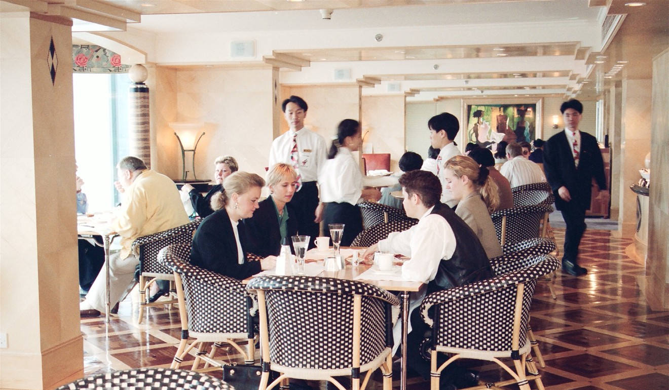 Waiters and waitresses at the Napa Restaurant inside the Kowloon Shangri-La Hotel. Photo: SCMP
