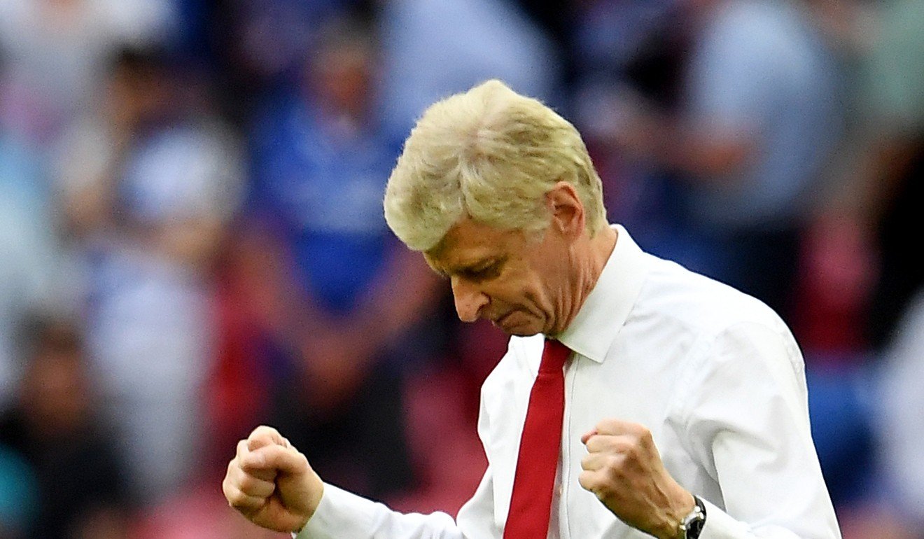 Arsene Wenger reacts after Arsenal's 2-1 win at Wembley Stadium. Photo: EPA