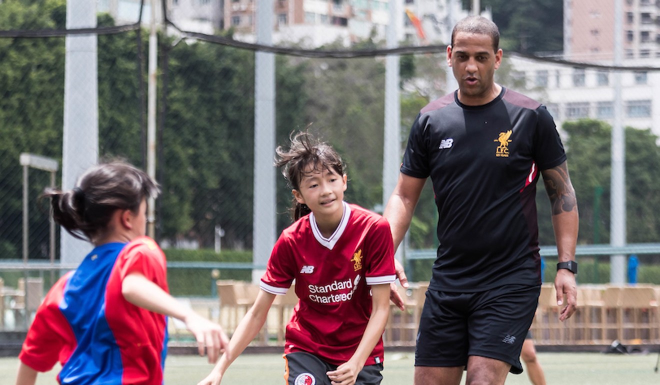 Phil Babb takes part in a children’s training session at the launch of the Premier League Asia Trophy 2017 at the Hong Kong Football Club. Photo: Premier League
