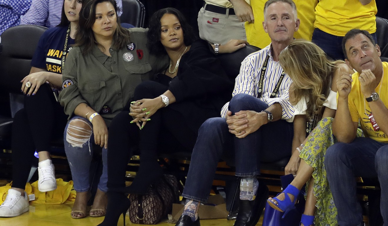 Rihanna (second left) during game one. Photo: AP