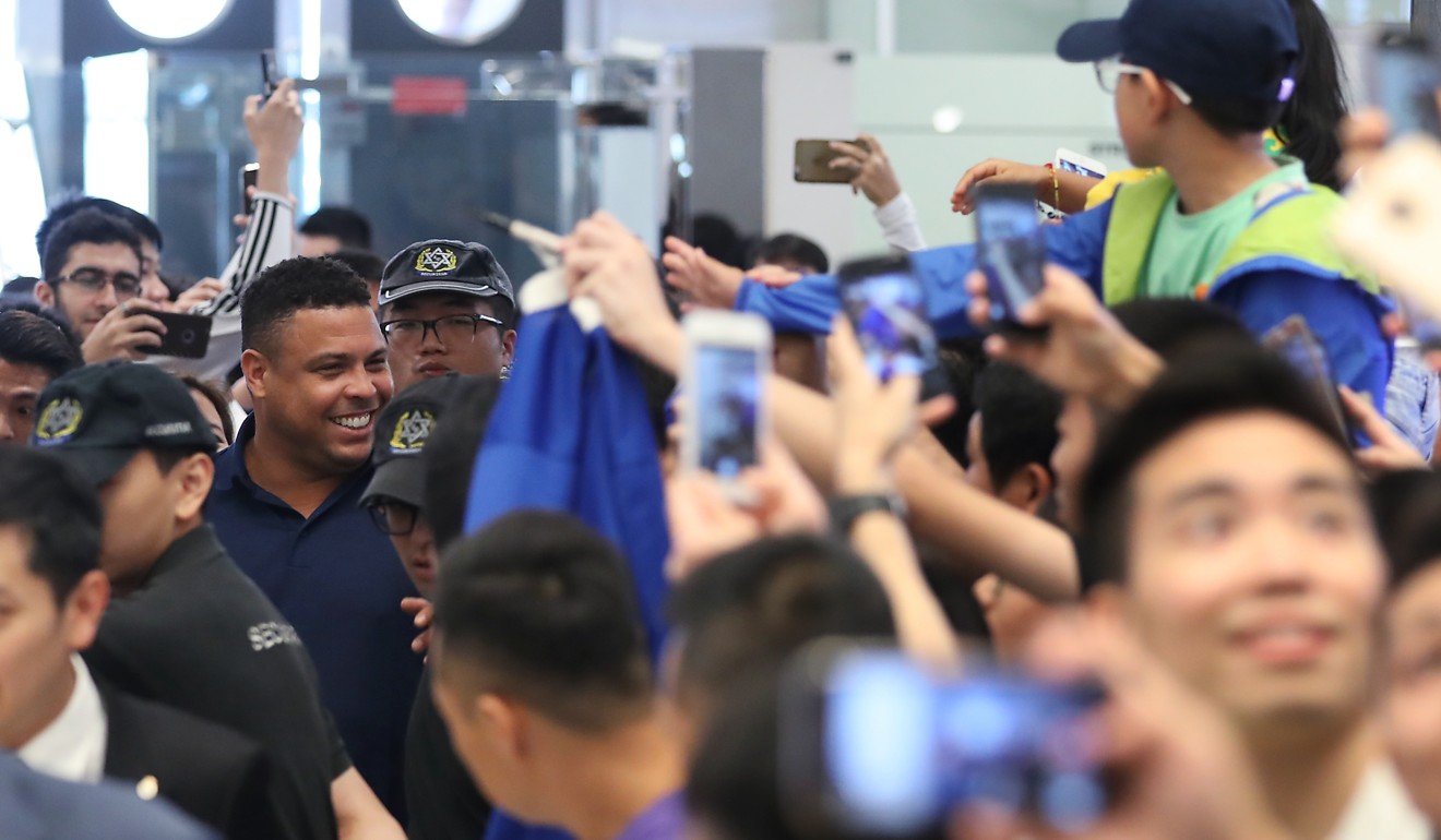 Brazilian legend Ronaldo is still as popular as ever as he attends a Real Madrid Foundation Clinic and Southern China Project presentation press conference arrives at the Marco Polo hotel in Tsim Sha Tsui. Photo: Edward Wong