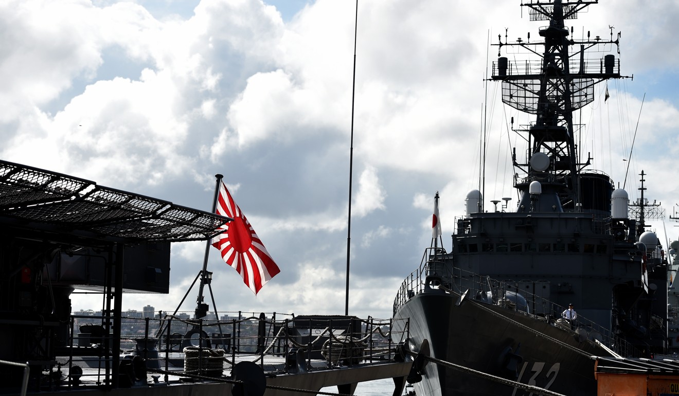 The Japanese navy flag flies on a Japanese Asagiri-class destroyer docked in Sydney’s Naval base. Japan and the United States, which take part in the Malabar drills with India, are both allies of Australia. Photo: AFP