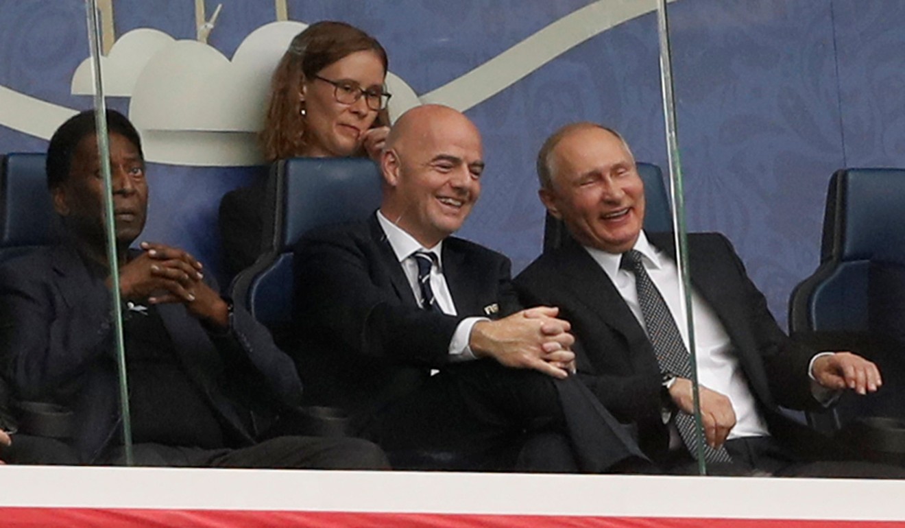 Fifa president Gianni Infantino (centre) with Russian President Vladimir Putin (right) and Pele in the stands. Photo: Reuters