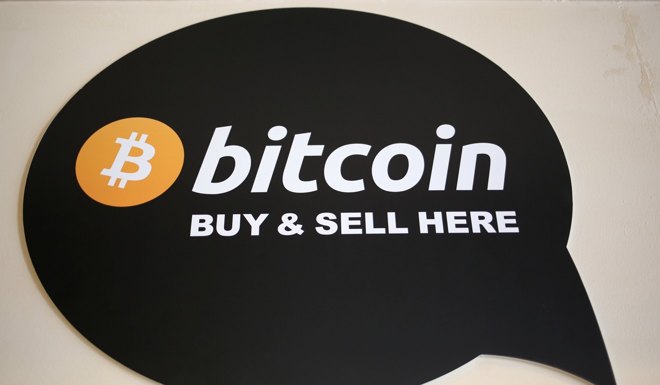 Bitcoin’s global acceptance is in evidence in this sign in a restaurant in Toronto, Canada. Photo: Reuters