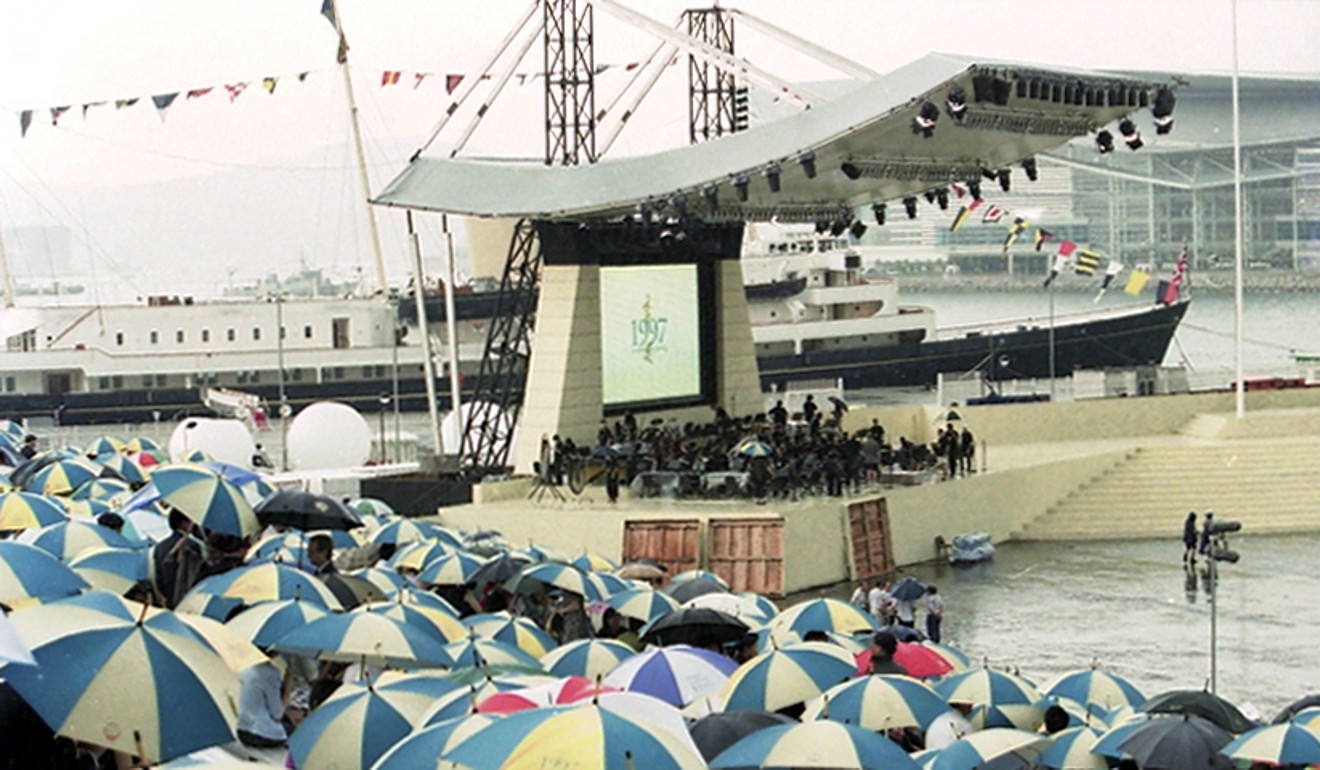 Members of Hong Kong Philharmonic Orchestra prepare to perform in the handover ceremony, which was marked by torrential rain. Photo: SCMP Pictures