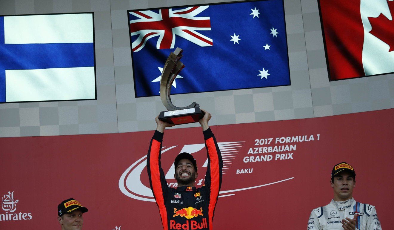 Red Bull Racing Formula One driver Daniel Ricciardo of Australia celebrates his victory. Photo: Reuters