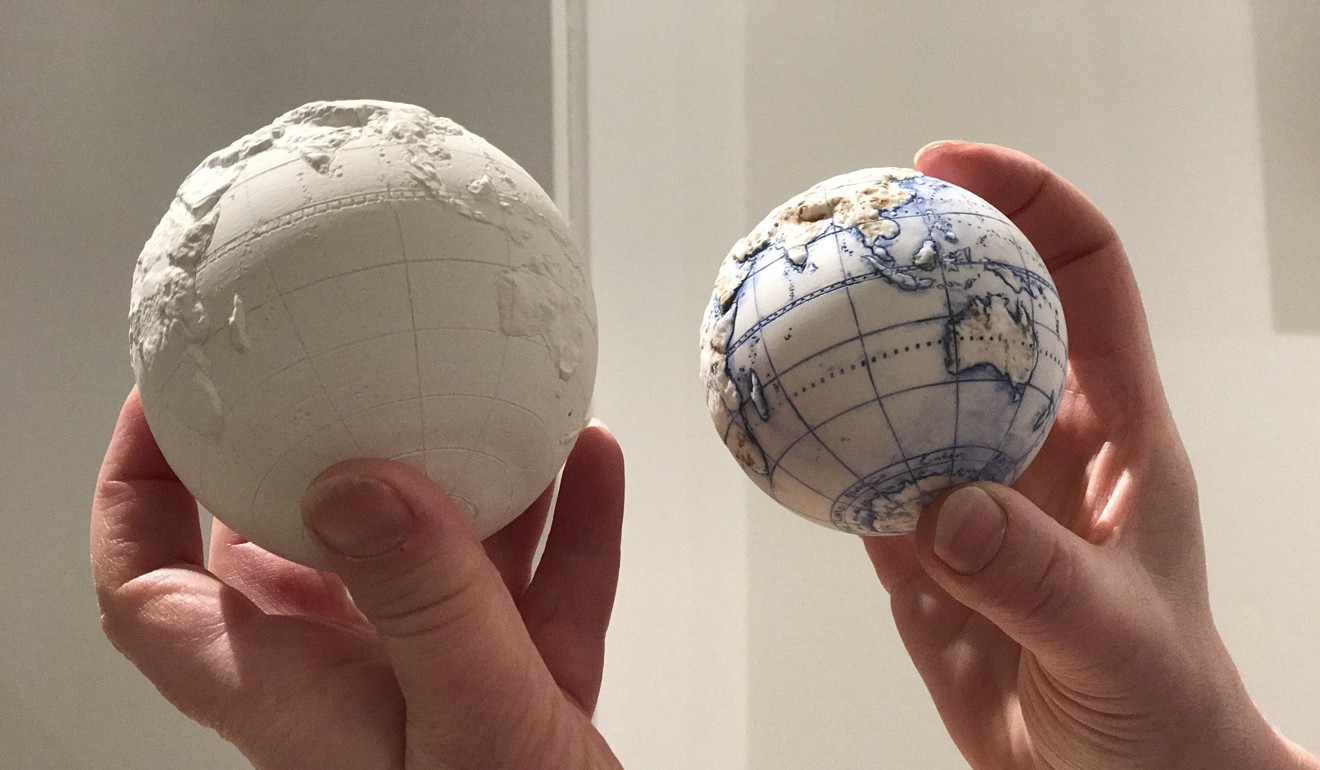 Hand-scribed, topographically correct miniature ceramic globes by Loraine Rutt, cartographic artist and founder of the Little Globe Company. Photo: Catherine Shaw