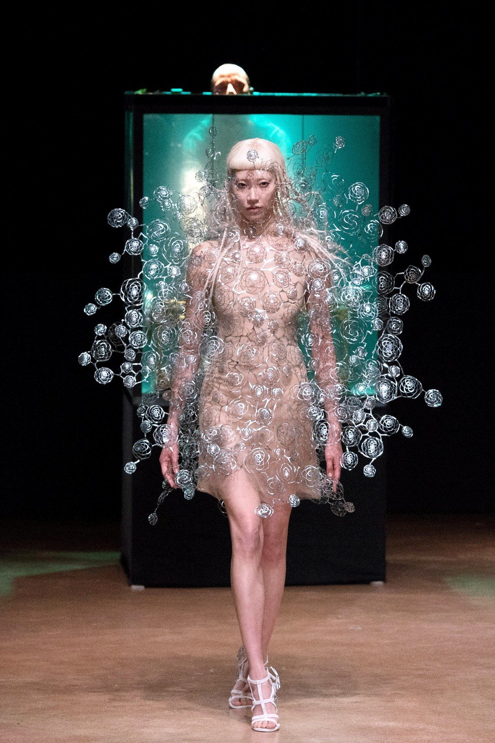 A model presents a futuristic design from Iris van Herpen at her haute couture autumn/winter 2017/2018 show in Paris. Photo: EPA