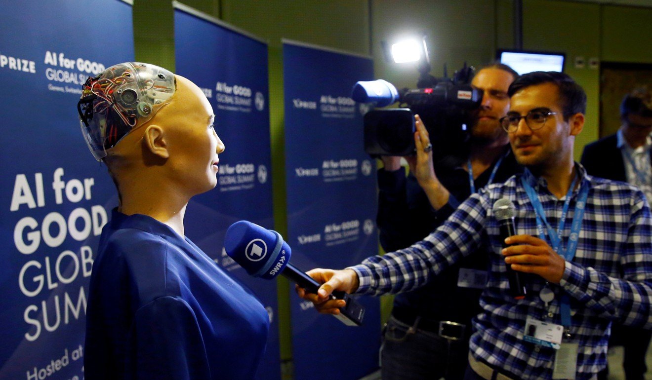 A TV crew interviews Sophia, a robot integrating the latest technologies and artificial intelligence created by Hanson Robotics. Photo: Reuters
