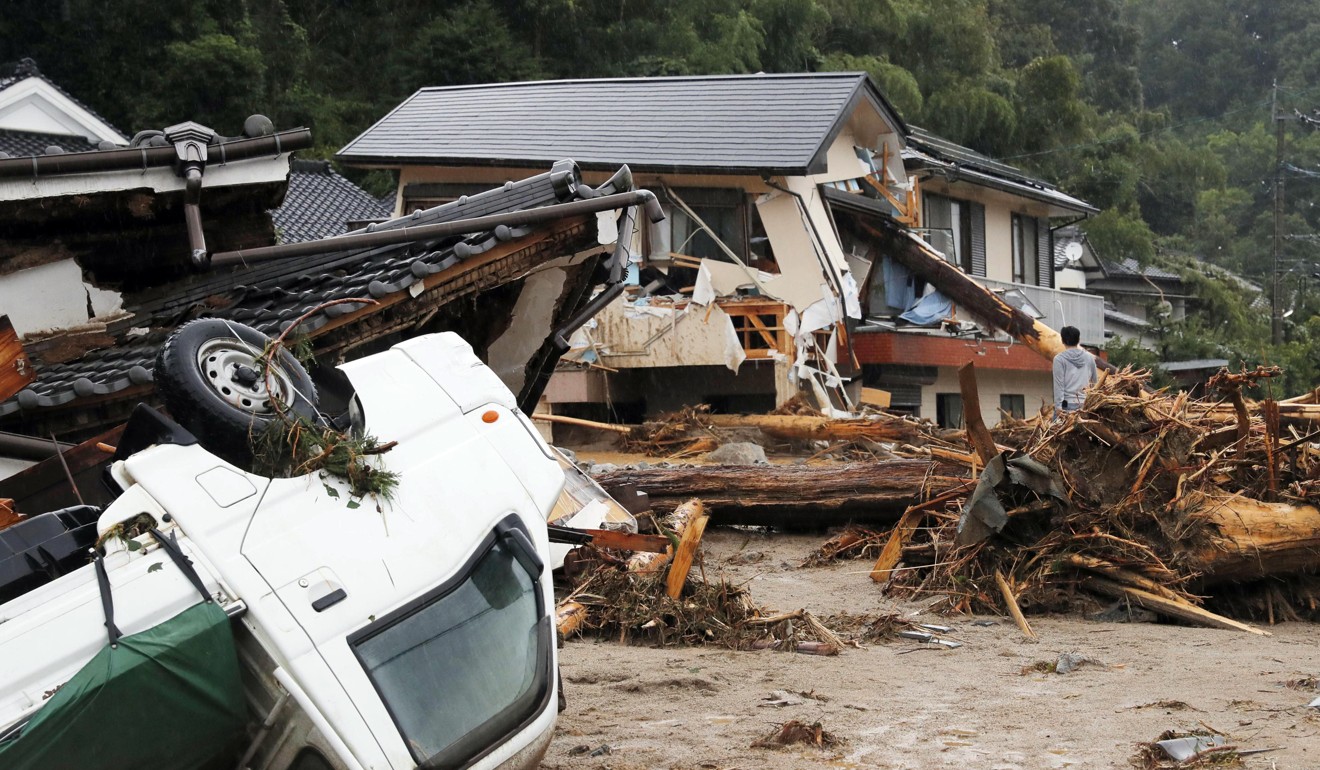 Debris caused by a swollen river in Asakura. Photo: Kyodo/AP