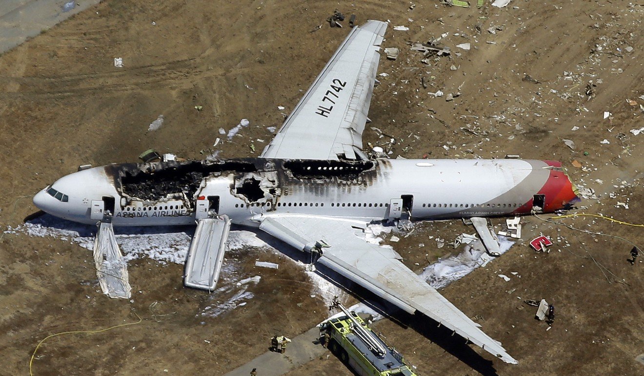 The wreckage of Asiana Flight 214 lies on the ground after it crashed at the San Francisco International Airport. Photo: AP