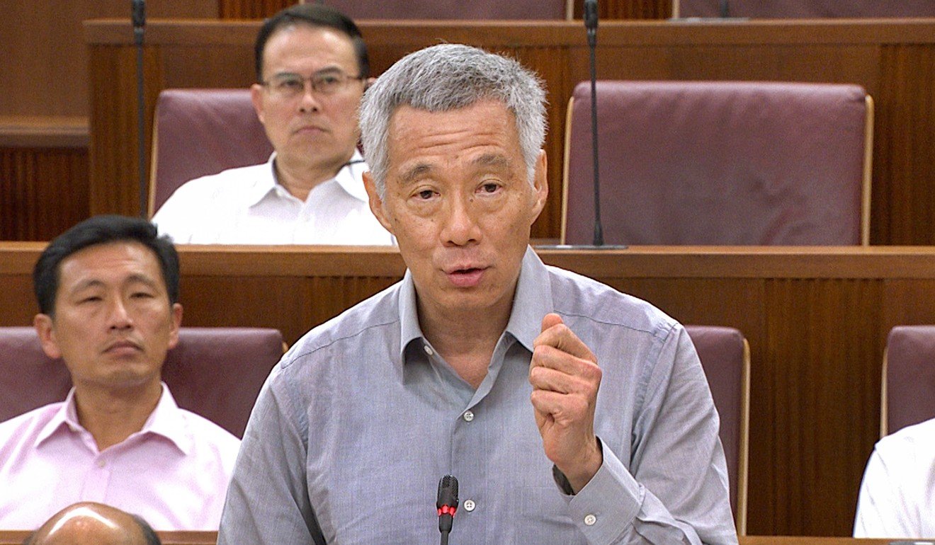 Singaporean Prime Minister Lee Hsien Loong speaks in parliament about his family’s dispute over the fate of his late father’s home at 38 Oxley Road. Photo: AFP